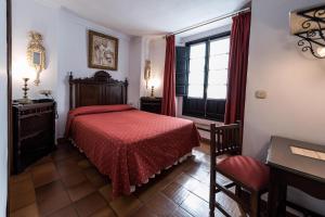 Posteľ alebo postele v izbe v ubytovaní Hotel Soho Boutique Palacio San Gabriel