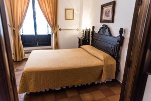 Posteľ alebo postele v izbe v ubytovaní Hotel Soho Boutique Palacio San Gabriel