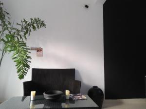 TV a/nebo společenská místnost v ubytování Satta Beach Deluxe