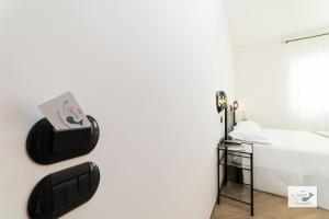 Łóżko lub łóżka w pokoju w obiekcie B&B Palazzo Pinto 2