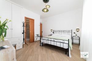 Łóżko lub łóżka w pokoju w obiekcie B&B Palazzo Pinto 2