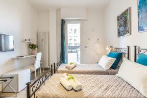 Postel nebo postele na pokoji v ubytování Central City Rooms