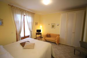 Postel nebo postele na pokoji v ubytování Casa Milena