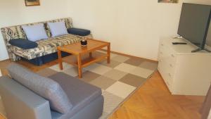 Et tv og/eller underholdning på Veli Brig Apartment