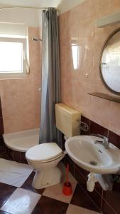 Et badeværelse på Veli Brig Apartment