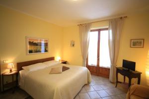 Postel nebo postele na pokoji v ubytování Casa Milena