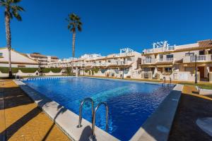 Bazén v ubytovaní PENTHOUSE CABO ROIG - ALDEAS I alebo v jeho blízkosti