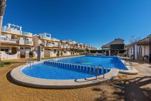 Bazén v ubytovaní PENTHOUSE CABO ROIG - ALDEAS I alebo v jeho blízkosti