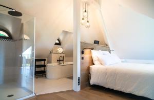 New Cottage & spa de nage Guesthouse客房内的一张或多张床位
