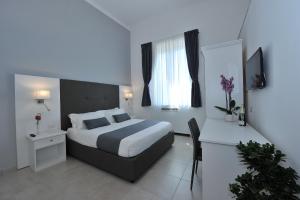 Postel nebo postele na pokoji v ubytování SorrentoBay + 30 fotografií