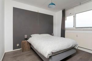 Postel nebo postele na pokoji v ubytování City centre apartment with a beautiful view #expat