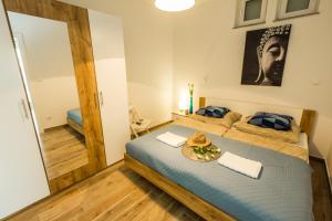 Postel nebo postele na pokoji v ubytování 2Bfree Apartments