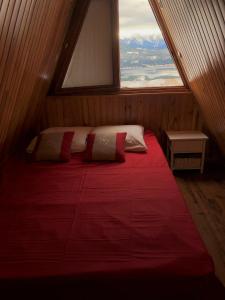 Llit o llits en una habitació de Là-Haut