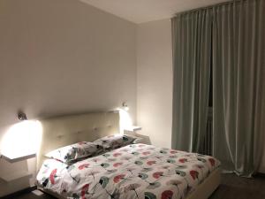 Tempat tidur dalam kamar di DIMORA MILANO