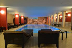 Bazén v ubytování Air Palace Hotel nebo v jeho okolí