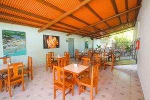 Areia do Atlantico Hotel tesisinde bir restoran veya yemek mekanı