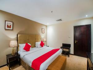 Łóżko lub łóżka w pokoju w obiekcie Eastward Hotel