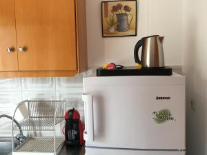 Cuina o zona de cuina de Cape Blue Apartments