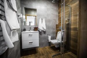 Kúpeľňa v ubytovaní Apartamenty przy skoczni