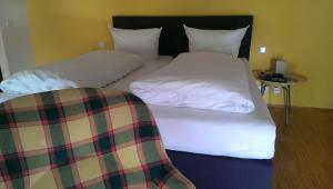 Postel nebo postele na pokoji v ubytování Hotel Zapa