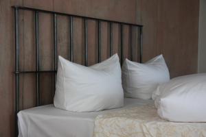 Postel nebo postele na pokoji v ubytování Hotel Zapa
