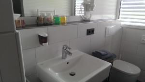 Koupelna v ubytování Hotel Zapa