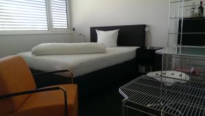 Postel nebo postele na pokoji v ubytování Hotel Zapa