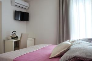 Postel nebo postele na pokoji v ubytování Casa La Torre