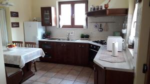 Kuchyňa alebo kuchynka v ubytovaní Apartman Lena Umag