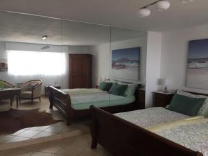 Letto o letti in una camera di Magie Du Léman