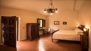 เตียงในห้องที่ Il Mulino della Signora Luxury Country House