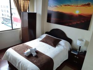 Letto o letti in una camera di La Merced Plaza Hospedaje