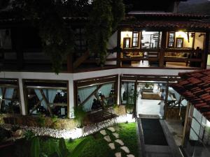 an aerial view of a house at night at Pousada Agua Viva in Abraão