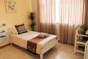 Postel nebo postele na pokoji v ubytování Omaruru Guesthouse