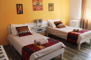 Postel nebo postele na pokoji v ubytování Omaruru Guesthouse