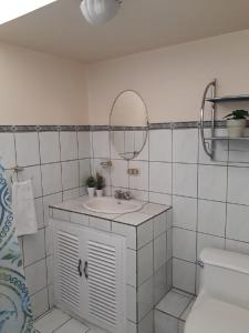 Ett badrum på Kubo Apartment