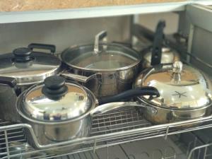 a group of pots and pans sitting in an oven at Lot 4 PD Villa in Port Dickson