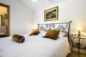 Postel nebo postele na pokoji v ubytování Villa Krcina