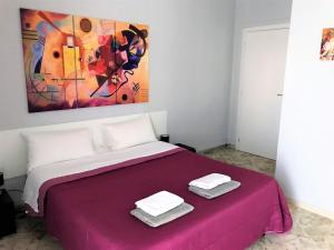 Säng eller sängar i ett rum på CAVOUR 124 -guest-room-