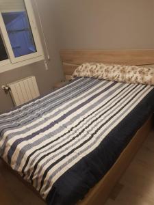 Katil atau katil-katil dalam bilik di Habitaciones en Ronda