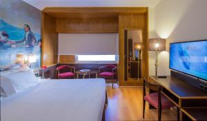Postel nebo postele na pokoji v ubytování Hotel Goya