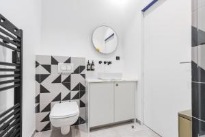 Koupelna v ubytování L'Abeille - Boutique Apartments