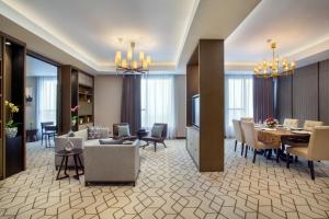 Posezení v ubytování Wyndham Opi Hotel Palembang