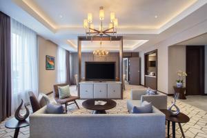 Posezení v ubytování Wyndham Opi Hotel Palembang