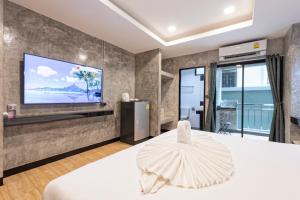 TV a/nebo společenská místnost v ubytování My Style Resort Hotel -SHA Plus