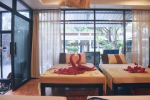 Postel nebo postele na pokoji v ubytování Simple Life Resort Koh Tao