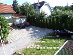 Vonkajšia záhrada v ubytovaní Táltos Vendégház