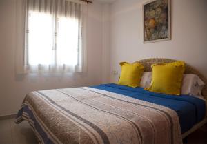 A bed or beds in a room at Villas Medes Mar - Plus Costa Brava