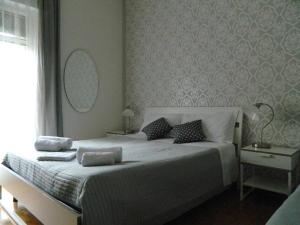 Cama o camas de una habitación en B&B Tosca