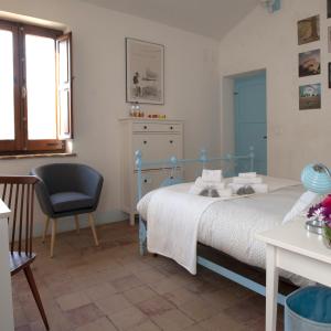 Postel nebo postele na pokoji v ubytování B&B Conca Del Pretore